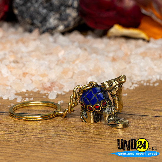 Brelok Dromader - złoty - inkrustowany kamieniami w kolorze granatowym